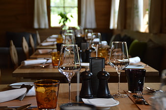 Elegant Restaurant Table Setting With Wine Glasses And Cutlery