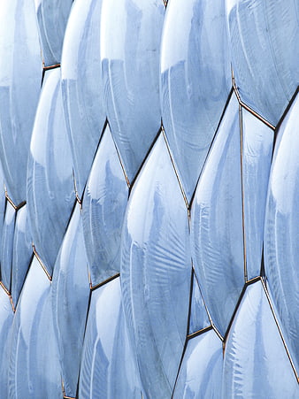 Abstract Blue Geometric Facade with Gold Accents