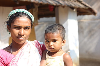 Portrait of Indian Mother and Toddler Child Outdoors