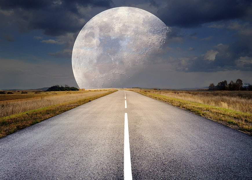 Giant Moon Over Rural Road at Dusk