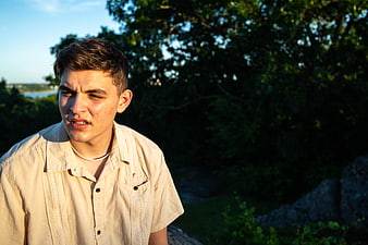 Young Man Portrait Outdoors in Golden Hour Sunlight