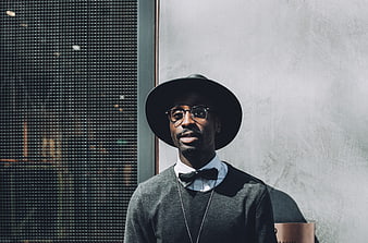 Stylish Black Man in Fedora and Bow Tie Portrait