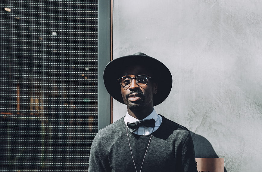 Stylish Black Man in Fedora and Bow Tie Portrait