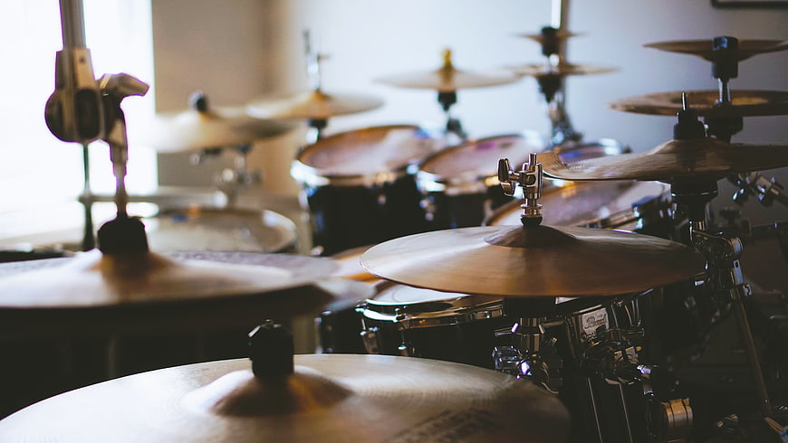 Close-up of drum kit cymbals in music studio