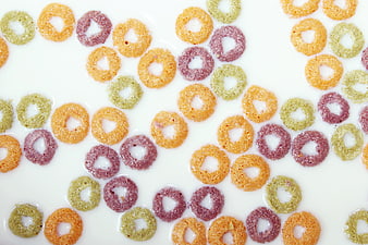 Colorful Fruit Loops Cereal in Milk Top View