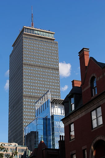 Modern Skyscraper and Historic Brick Building Cityscape