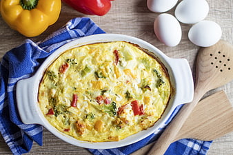 Baked Vegetable Quiche in White Dish with Fresh Eggs and Peppers