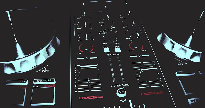 Close-up of Pioneer DJ Controller with Faders and Knobs