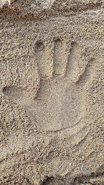 Handprint in Sand Texture Close-Up