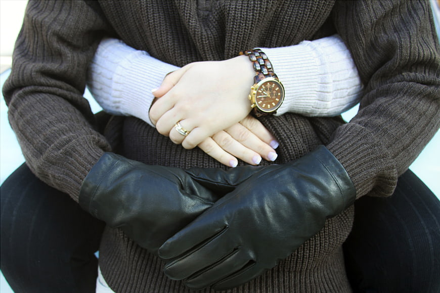 Couple Embracing with Leather Gloves and Watch