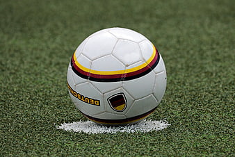 German soccer ball on artificial turf field