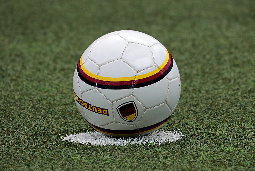German soccer ball on artificial turf field