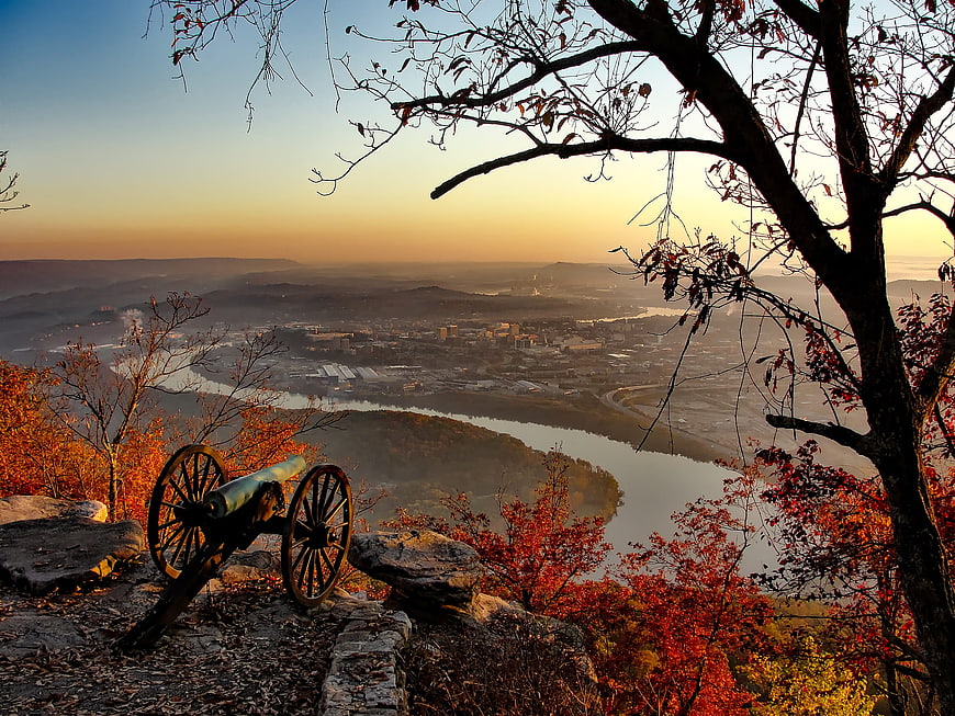 Historic Civil War Cannon Overlooking Chattanooga River at Autumn Sunset