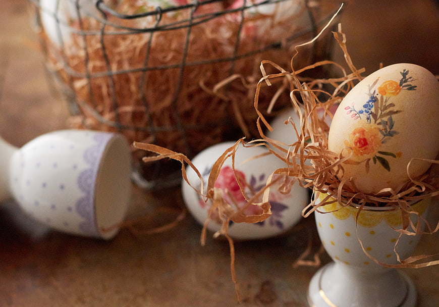 Decorative Easter Eggs in Ceramic Holders with Floral Patterns