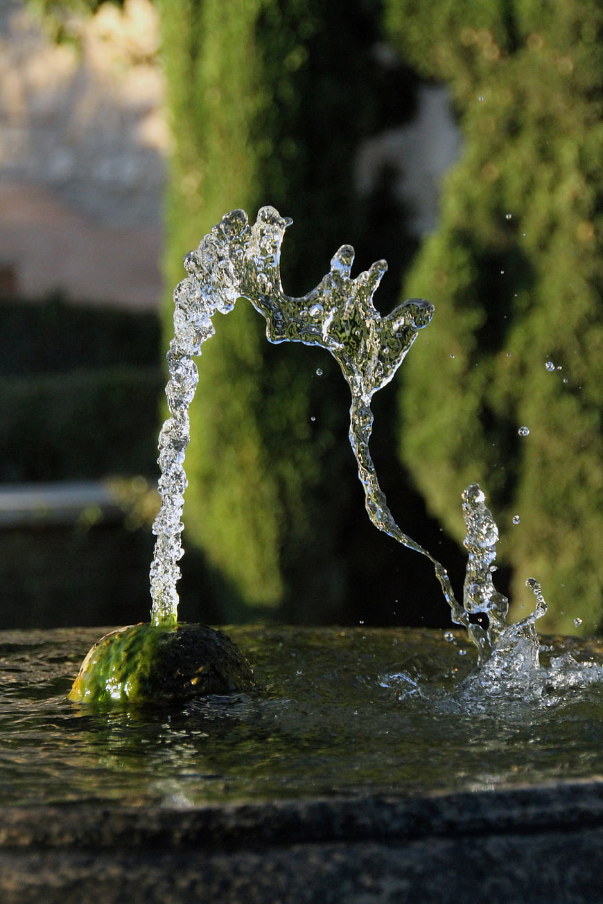 Dynamic Water Splash from Garden Fountain Jet