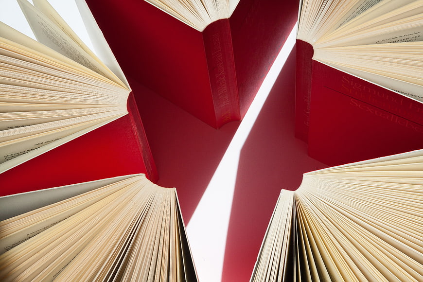 Red Open Books Arranged in Circle Pattern