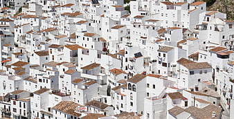 White houses with terracotta roofs in Spanish village
