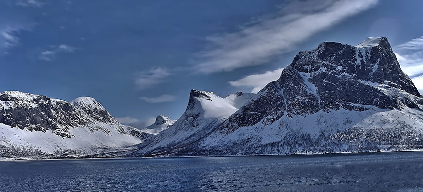 Snow-Covered Mountains and Fjord in Winter