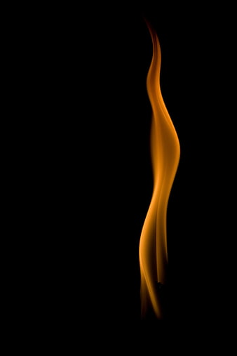 Single Orange Flame on Black Background