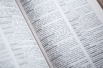 Close-up of open Russian dictionary page with text