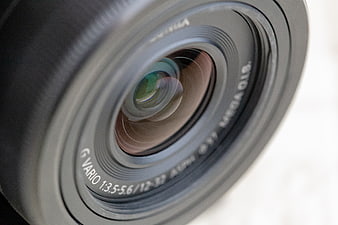 Close-up of Camera Lens with Glass Reflections
