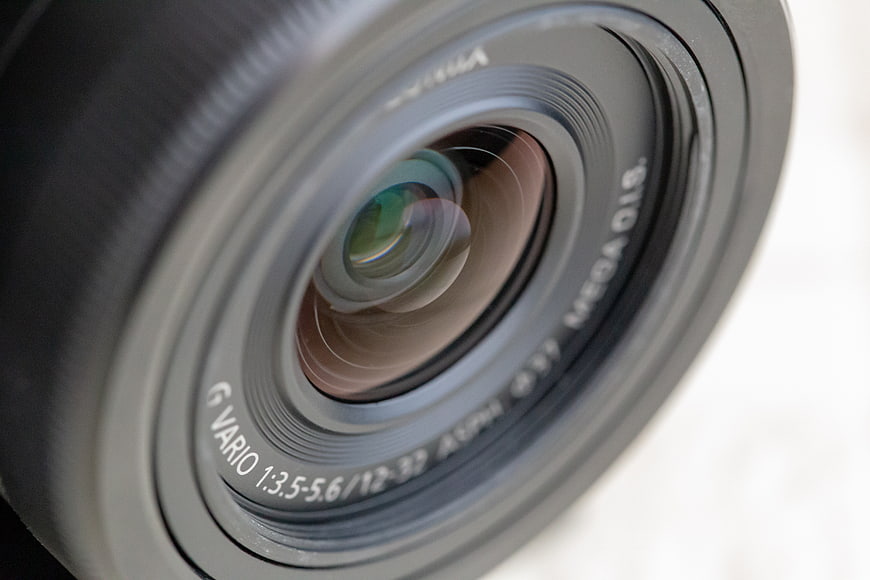 Close-up of Camera Lens with Glass Reflections