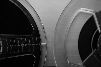 Close-up of vintage reel-to-reel tape recorder reels