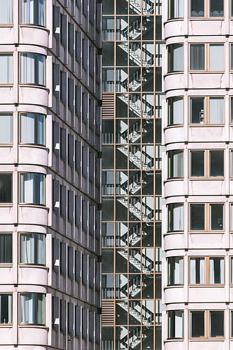 Modern Apartment Building Facade with Stairwell Pattern