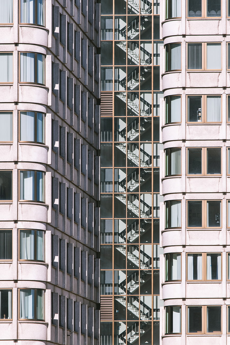 Modern Apartment Building Facade with Stairwell Pattern