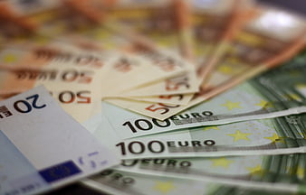 Close-up of mixed Euro banknotes including 20, 50, and 100 Euro bills