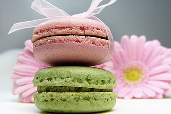 Stacked Pink and Green Macarons with Ribbon and Gerbera Flowers