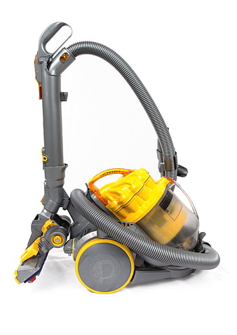 Yellow and Gray Canister Vacuum Cleaner Isolated on White