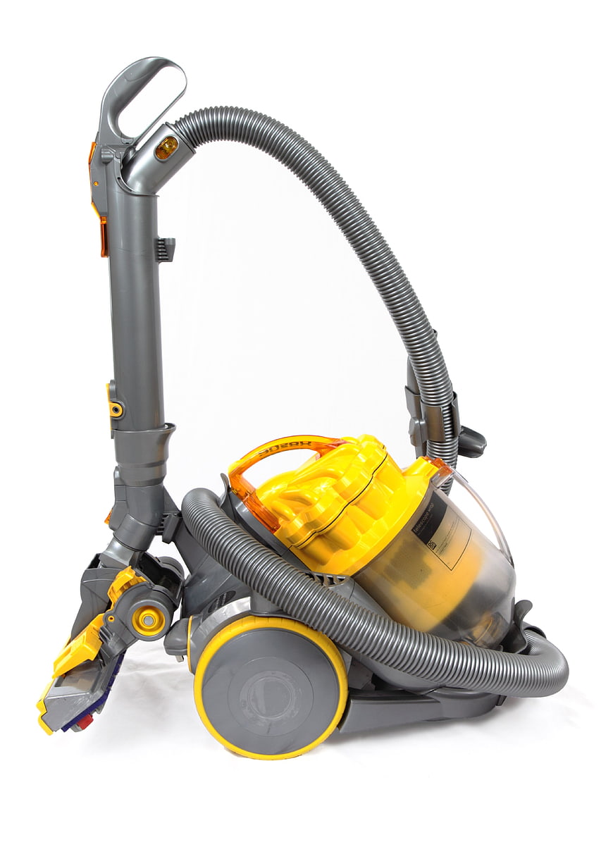 Yellow and Gray Canister Vacuum Cleaner Isolated on White