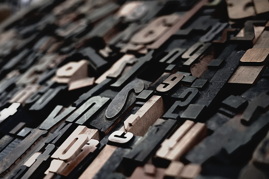 Close-up of vintage wooden letterpress printing blocks