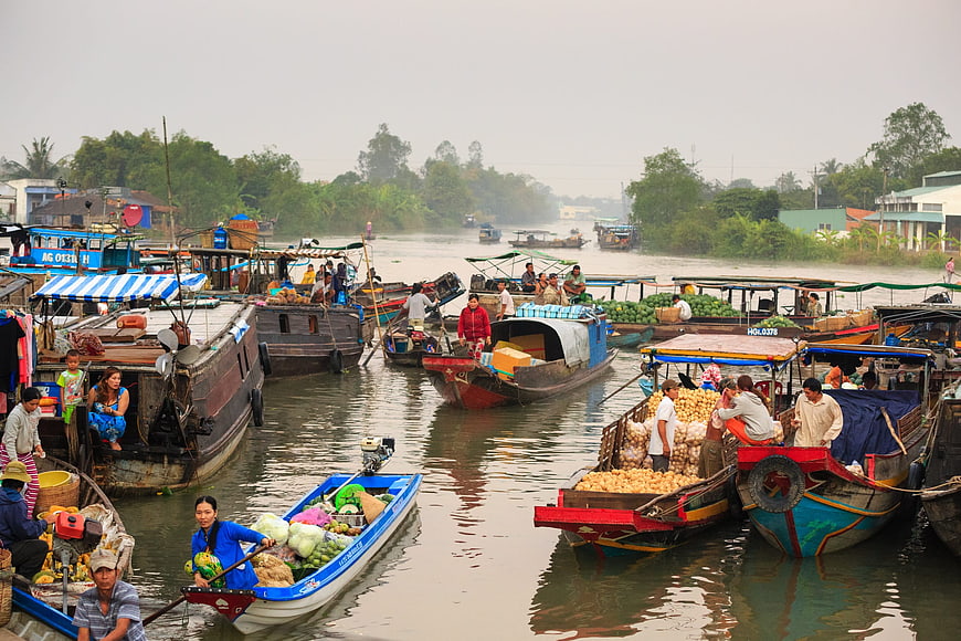 Traditional Floating Market Scene on a River in Vietnam