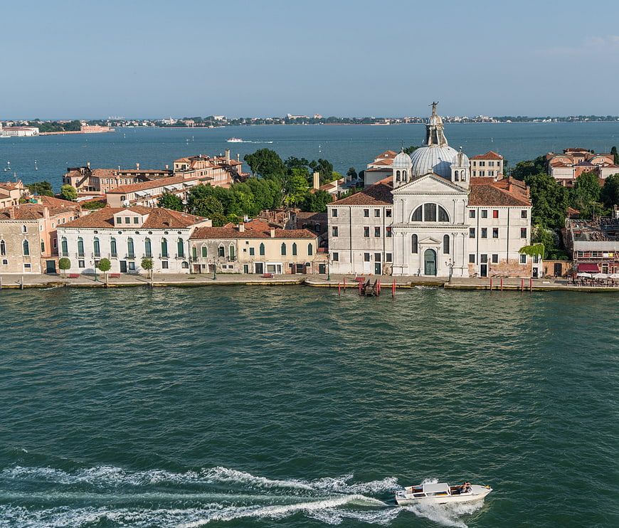 Aerial View of Venice Lagoon with Church and Motorboat