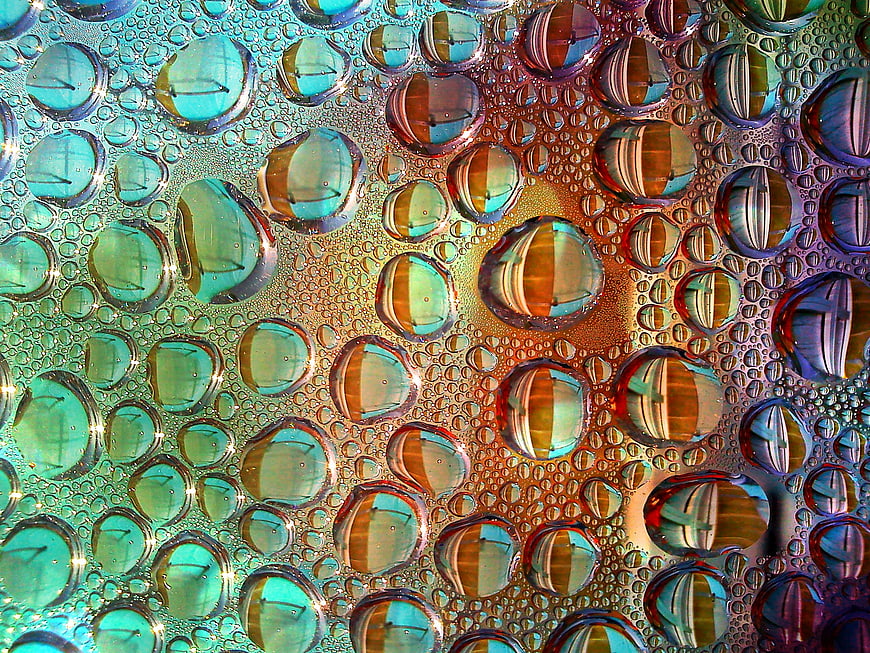 Macro Abstract Water Droplets with Colorful Reflections
