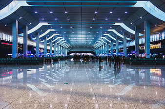 Modern Airport Terminal Interior with Reflections