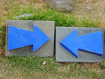 Two Concrete Slabs with Blue Arrows Pointing in Opposite Directions