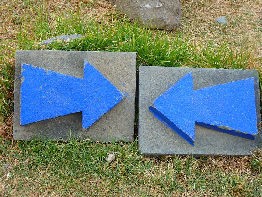 Two Concrete Slabs with Blue Arrows Pointing in Opposite Directions