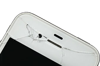 Close-up of cracked white smartphone screen on white background