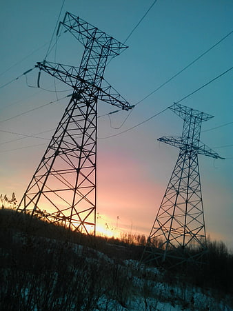 Silhouette of High Voltage Power Lines at Sunset