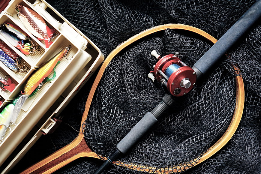 Fishing gear with rod, reel, net, and tackle box
