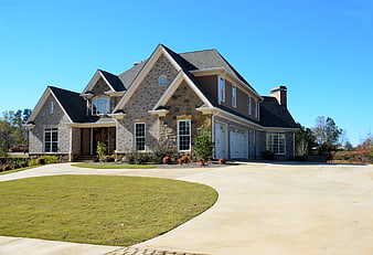 Luxury Stone and Brick Home with Driveway