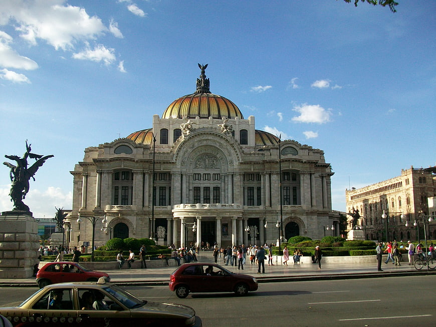 Palacio de Bellas Artes in Mexico City with traffic and pedestrians
