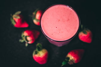 Top View Strawberry Smoothie with Fresh Berries on Dark Background