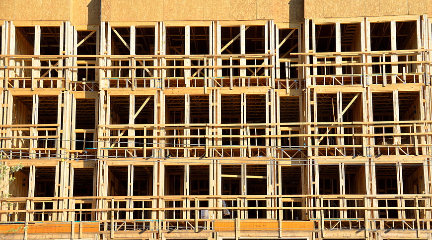 Wooden framing of a multi-story building under construction