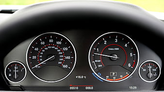 Car Dashboard Instrument Cluster with Speedometer and Tachometer