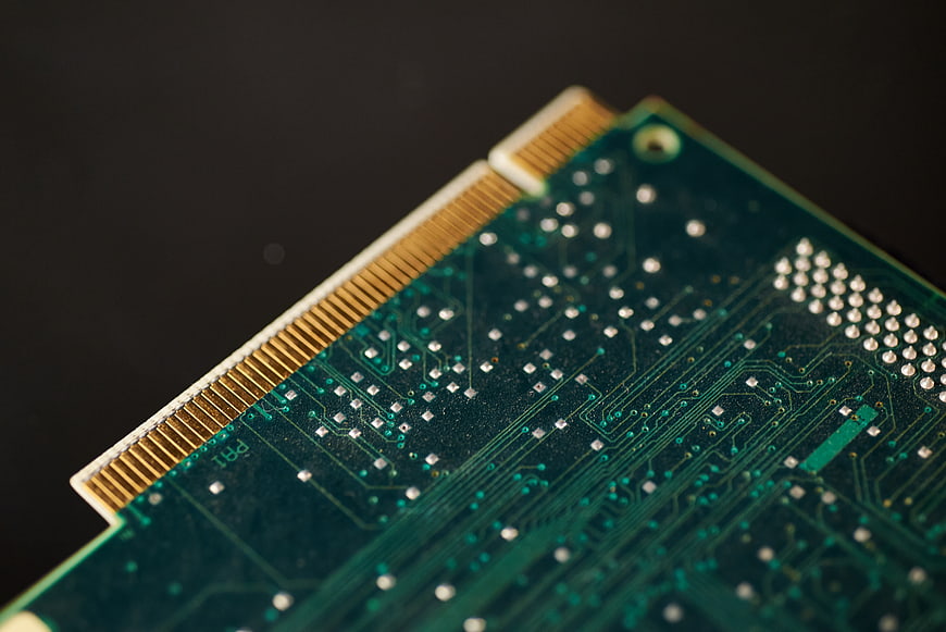 Close-up of Green Circuit Board with Gold Connectors