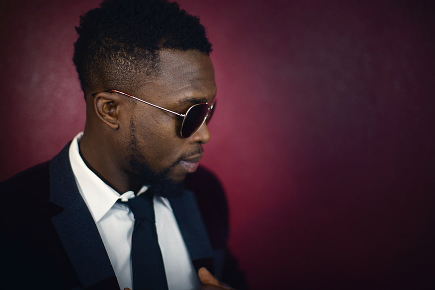 Stylish African American Man in Suit and Sunglasses